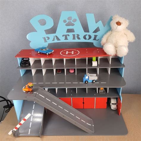 However, you'll surely improve your reflexes and hand-to-eye coordination with the help of the cute pups. . Paw patrol garage